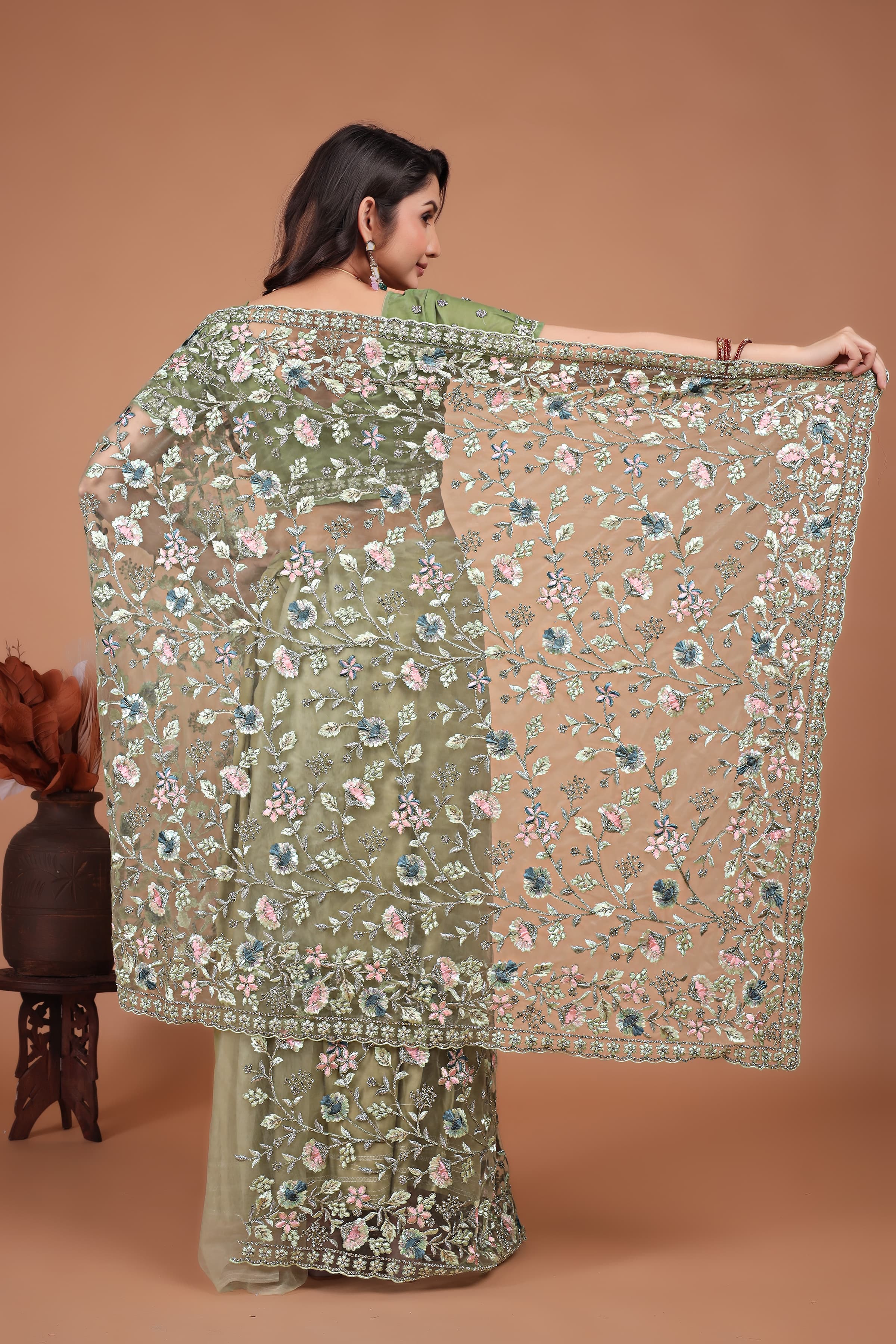 Ritual Styles Pista Green Coading Swarovski Floral Embroidery Net Saree image 1
