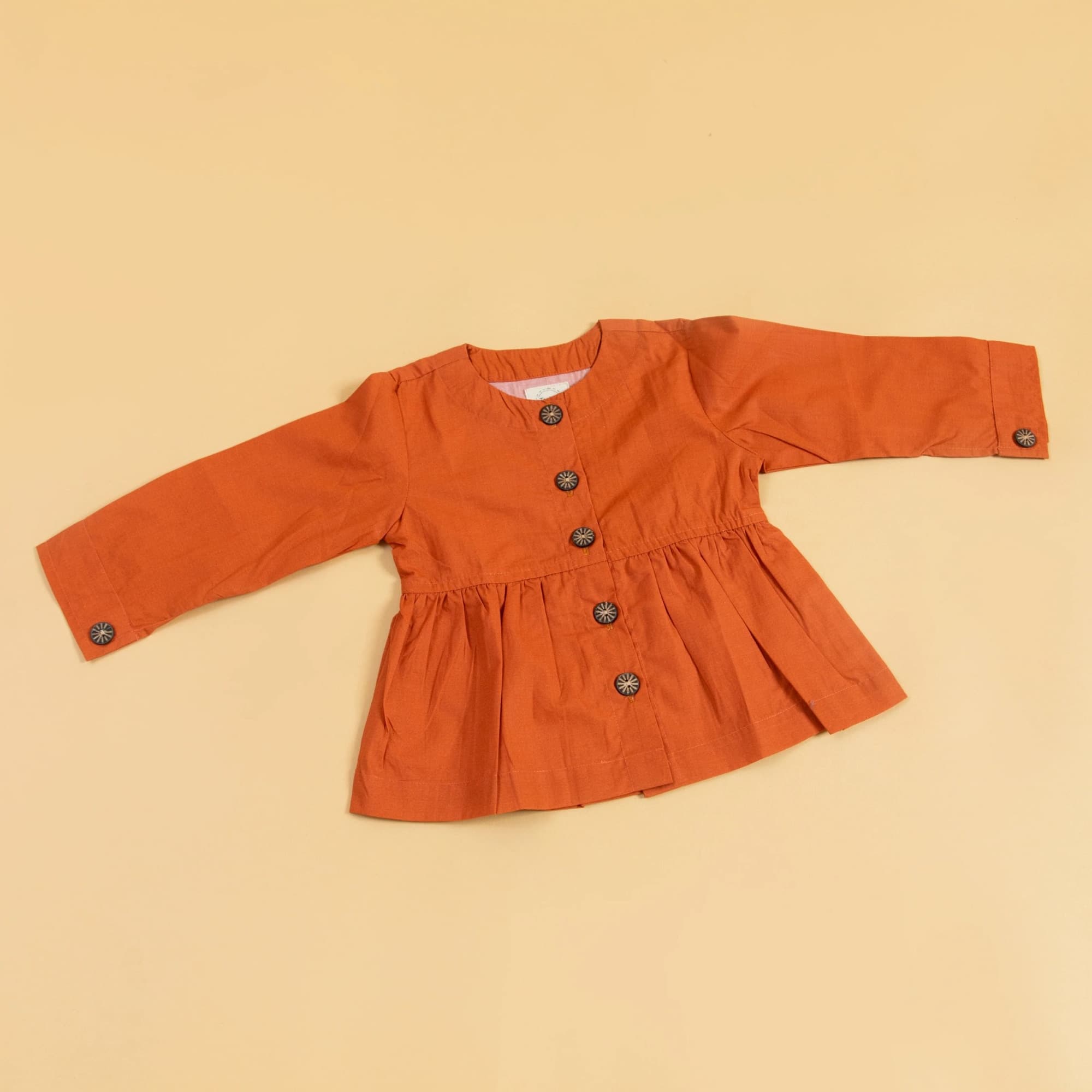 Rust Peplum Top hover